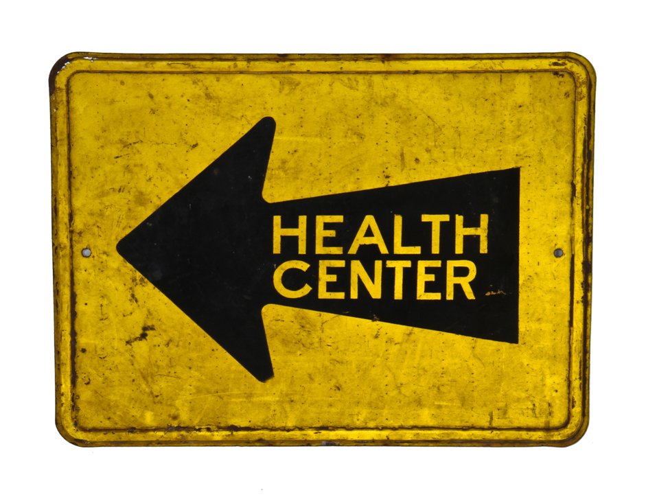 late 1960's original american single-sided wall-mount bright yellow "health center" stamped steel directional sign with reflective surface