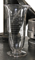 c. 1900's original antique american medical freestanding lightly etched 16 fluid ounce pressed glass conical measure with pedestal base