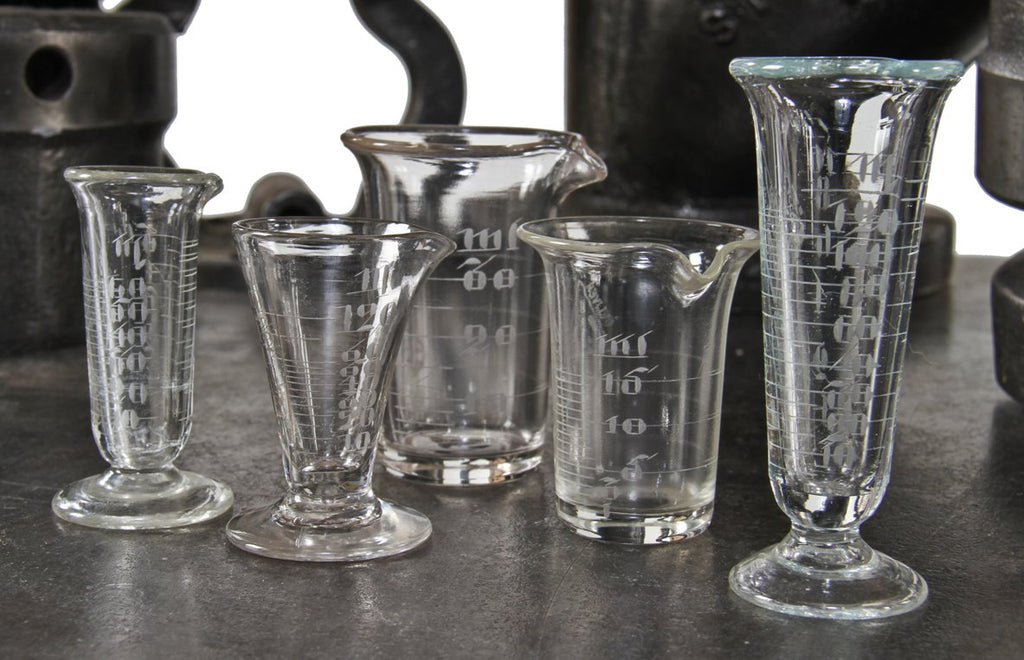 group of original early 20th century american antique medical or apothecary drugstore diminutive pressed laboratory glassware