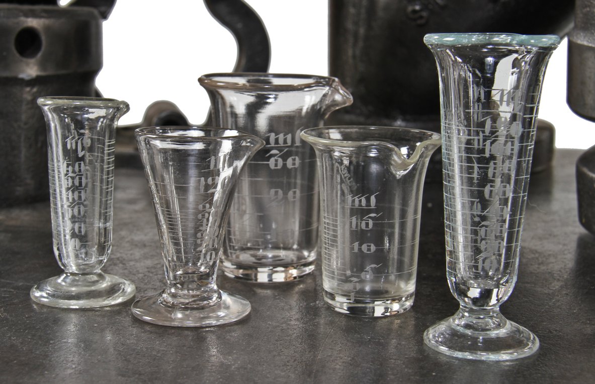 group of original early 20th century american antique medical or apothecary drugstore diminutive pressed laboratory glassware