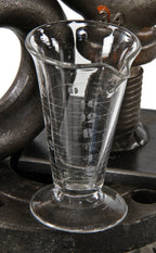 one of several early 20th century antique american pharmacy or research laboratory pressed glass conical-shaped measure with lightly etched markings