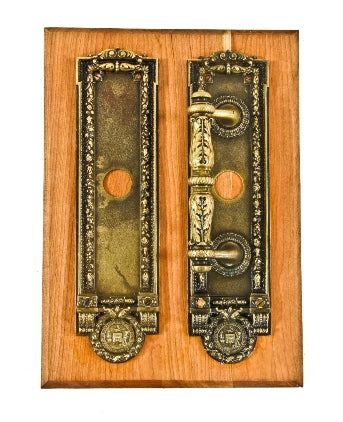 highly sought after early 20th century ornamental cast brass chicago city hall emblematic door handle and push plate set featuring detailed chicago city seals