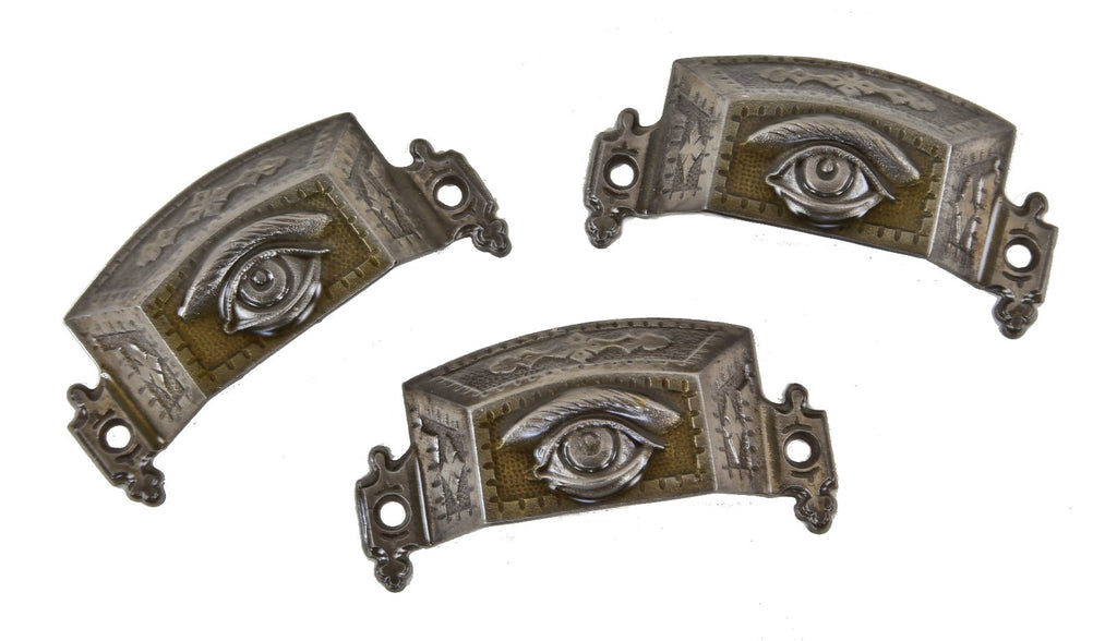 group of three original c. 1870's original antique american ornamental cast iron "seeing eye" cabinet drawer pulls with brushed metal finish