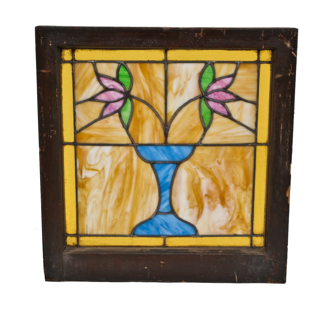 vibrantly colored early 1920's original antique american craftsman style interior residential stained glass window featuring a blue vase and pink petaled flowers