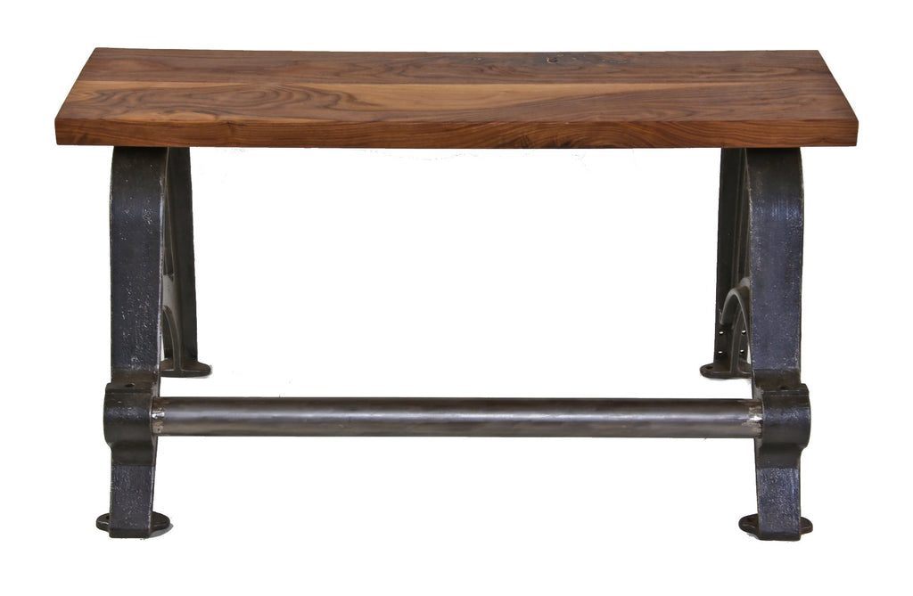 very unique repurposed american industrial heavy duty stationary sitting bench with a newly added walnut wood top and oversized steel pipe footrest