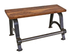 very unique repurposed american industrial heavy duty stationary sitting bench with a newly added walnut wood top and oversized steel pipe footrest
