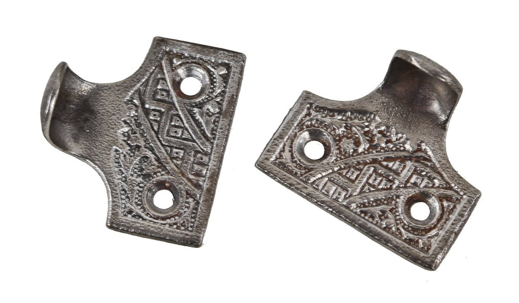 matching set of original late 19th or early 20th century american eastlake style "ceylon" pattern cast iron residential window sash lifts
