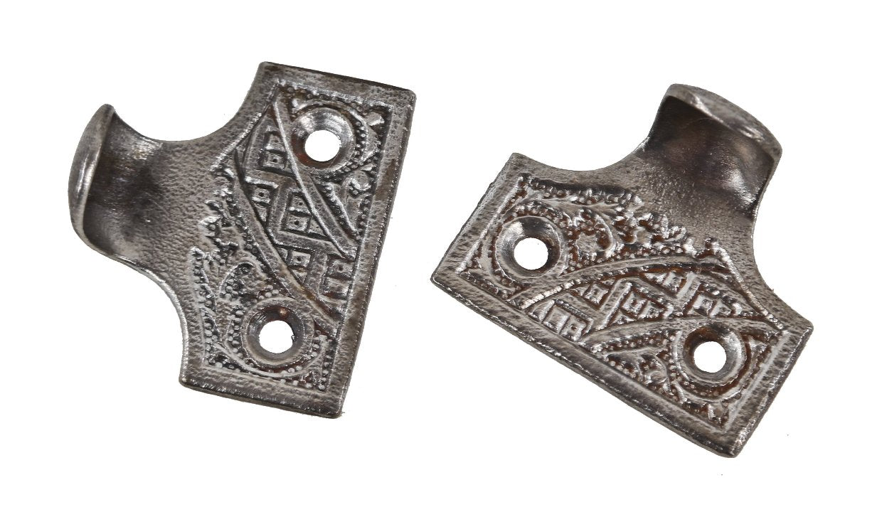 matching set of original late 19th or early 20th century american eastlake style "ceylon" pattern cast iron residential window sash lifts