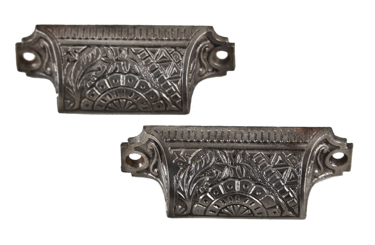 original late 19th century matching ornamental cast iron interior residential "oriental" pattern cabinet drawer or bin pulls with brushed metal finish
