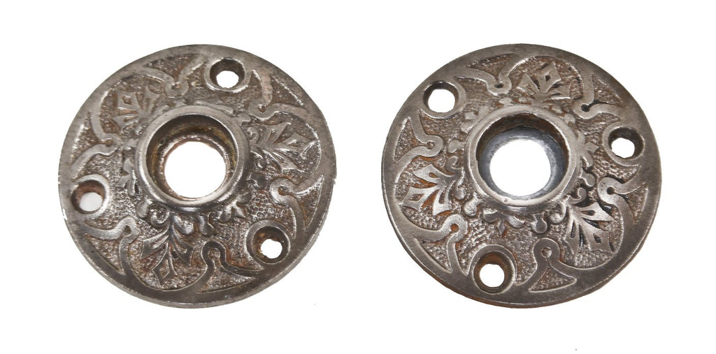 original 19th century antique american victorian era ornamental cast iron interior residential passage door rosettes with repeating palmette design motif