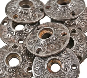 original 19th century antique american victorian era ornamental cast iron interior residential passage door rosettes with repeating palmette design motif