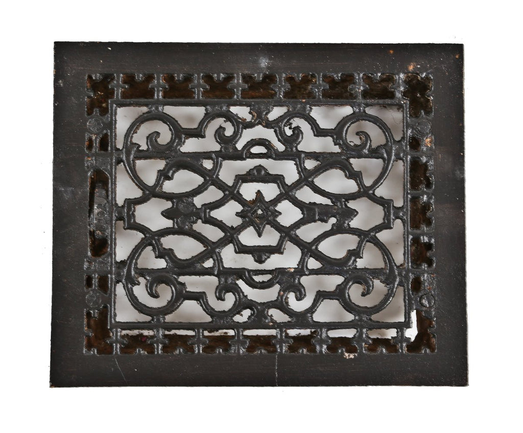 single late 19th century original and largely intact antique american ornamental black enameled cast iron floor or wall register
