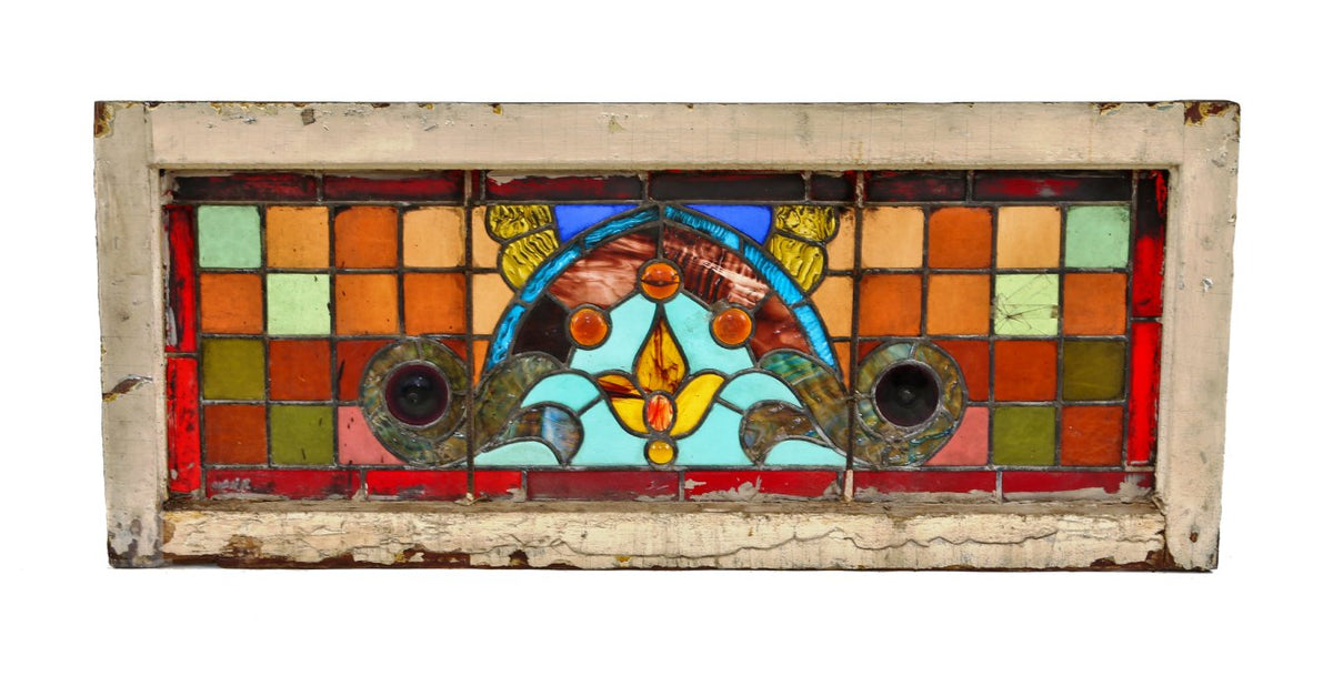 19th century american victorian era antique interior residential stained glass transom window accentuated with multiple diminutive jewels and oversized circular rondels