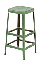 original "factory green" painted four-legged pressed and folded steel "lyon" american industrial stationary stool with a plurality of welded joint stretchers