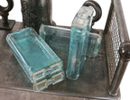 four early 20th century original and intact american antique industrial aqua blue glass exide rural residential thinly-shaped power plant battery jars with acid-spill glass covers