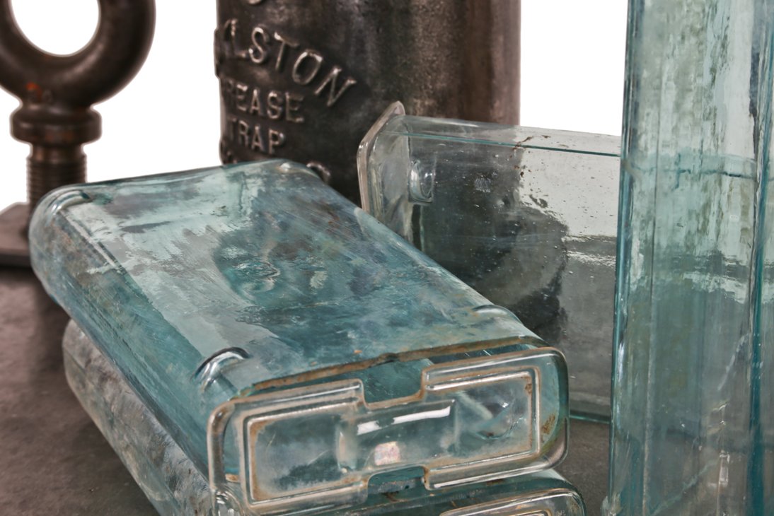 four early 20th century original and intact american antique industrial aqua blue glass exide rural residential thinly-shaped power plant battery jars with acid-spill glass covers