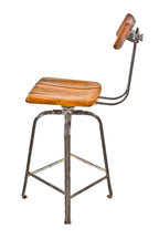 refinished c. 1920's original and fully functional american industrial adjustable height angled steel switchboard operator's swivel chair with fully contoured pivoting backrest