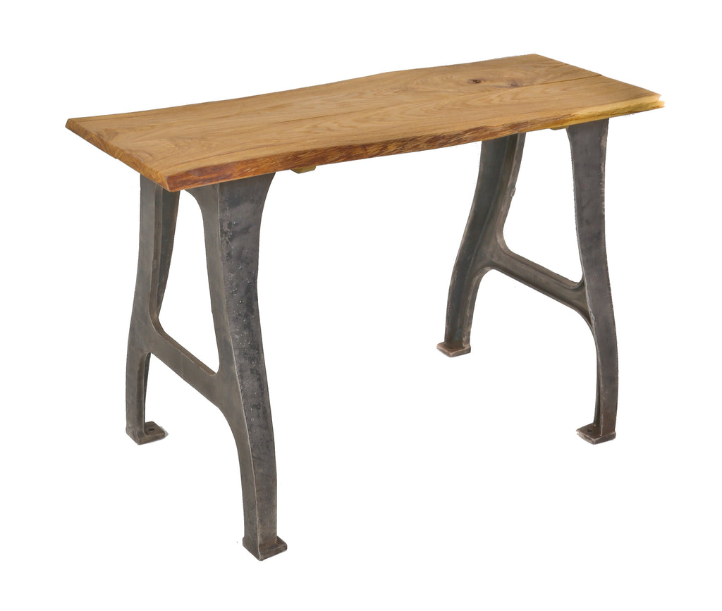 repurposed antique american industrial stationary console or side table featuring heavy duty cast iron arbor press machine legs and old growth oak wood slab top