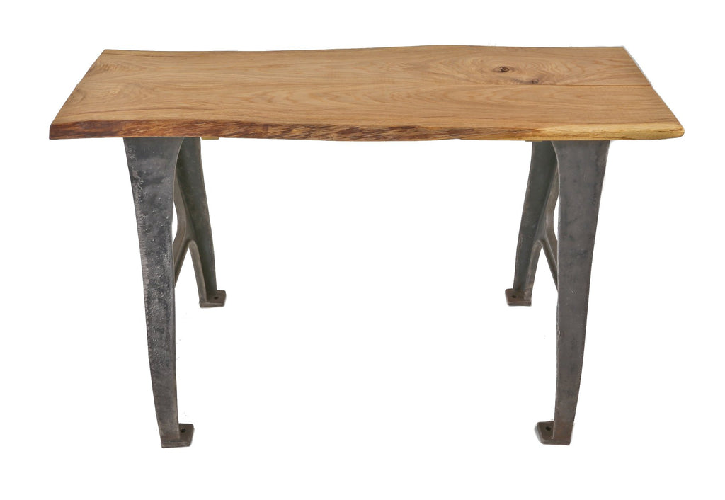 repurposed antique american industrial stationary console or side table featuring heavy duty cast iron arbor press machine legs and old growth oak wood slab top