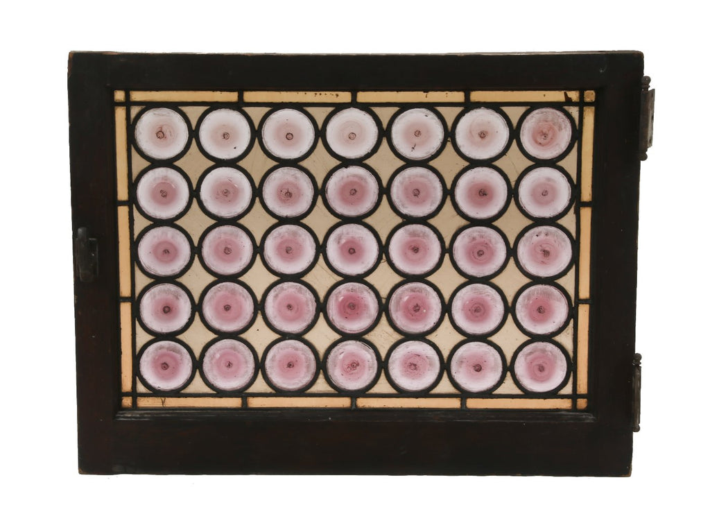 single all original 19th century american victorian era leaded art glass window featuring oversized turned light purple roundels or "bullseyes"