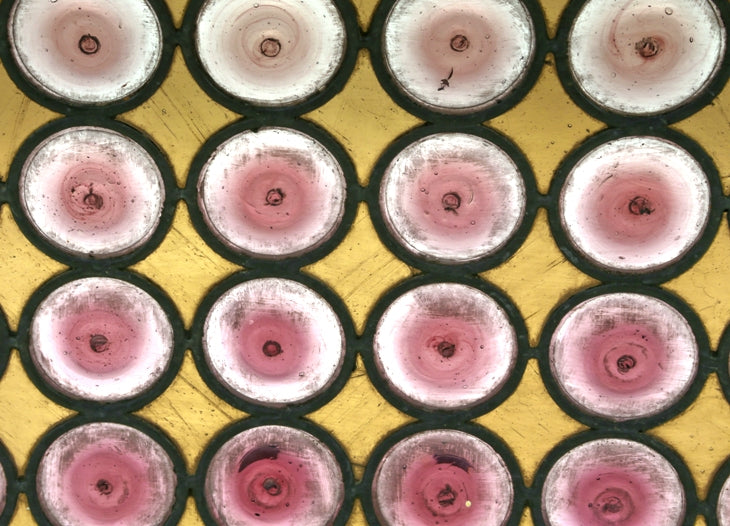 single all original 19th century american victorian era leaded art glass window featuring oversized turned light purple roundels or "bullseyes"