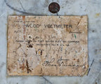 late 19th century ornamental cast bronze "wood type" flush mount switchboard volmeter with original certification label signed by thomas duncan