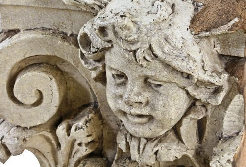 historically important largely intact documented museum-quality c. 1926 eichenbaum-designed granada theater facade white glazed terra cotta cherub head fragment with allover crazing