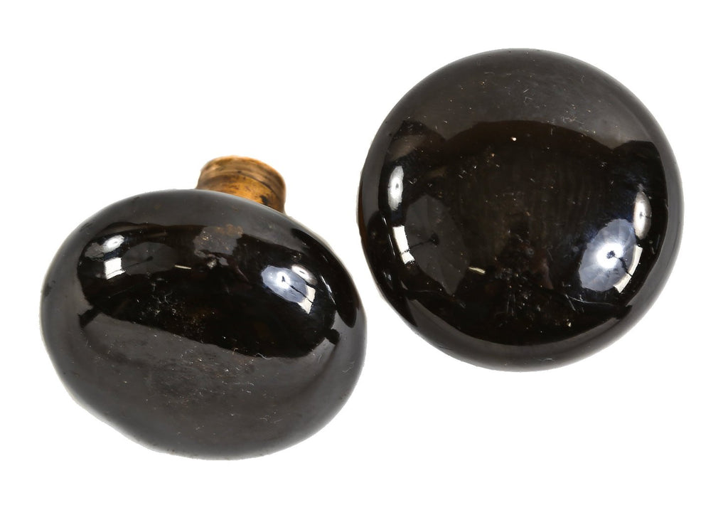 pair of original 19th century antique american "jet black" porcelain interior residential passage door size doorknobs with intact cast brass shanks