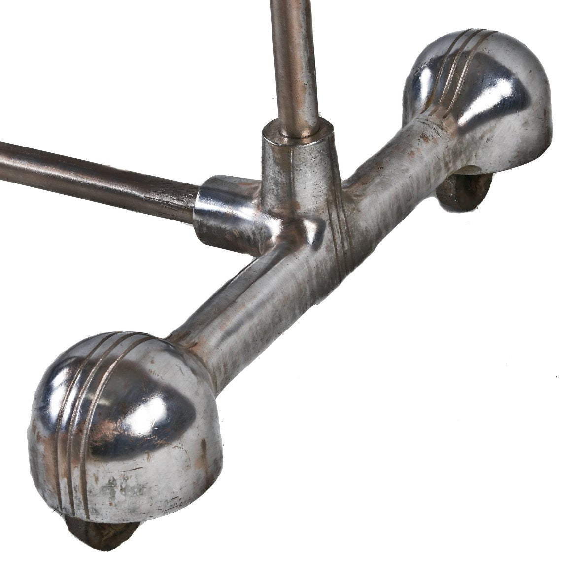 c. 1930's american art deco style mobile machine age tubular steel clothing store garment or clothing rack with distinctive incised line caster hoods