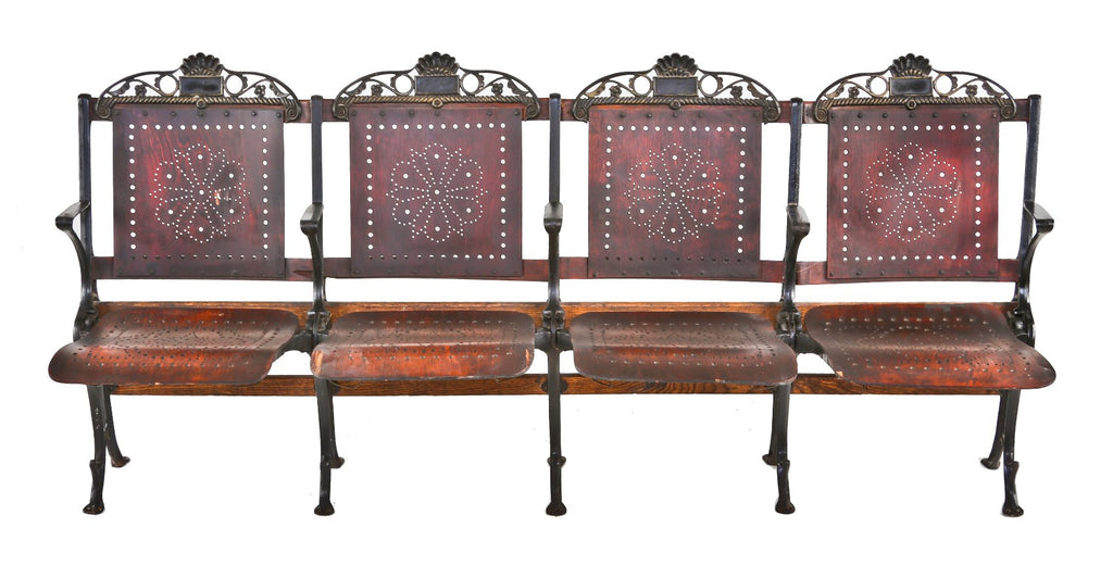 original and largely intact antique american freestanding interconnected four-seat chicago theater folding chair section with heavily ornamented cast iron backrests