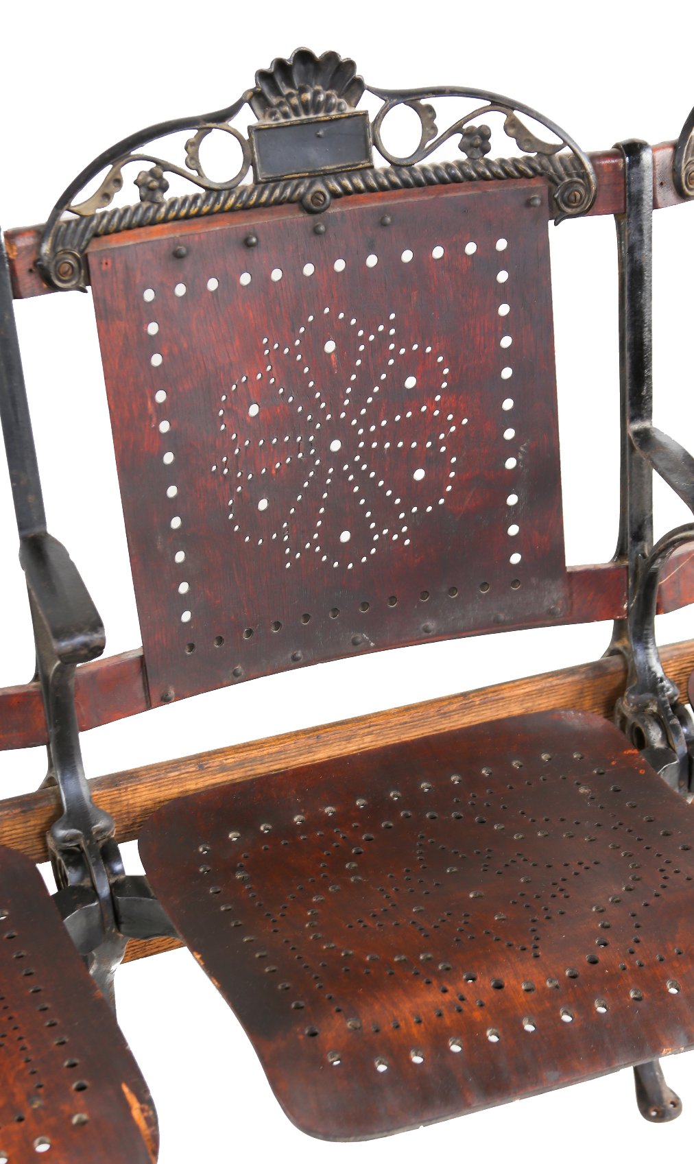 original and largely intact antique american freestanding interconnected four-seat chicago theater folding chair section with heavily ornamented cast iron backrests