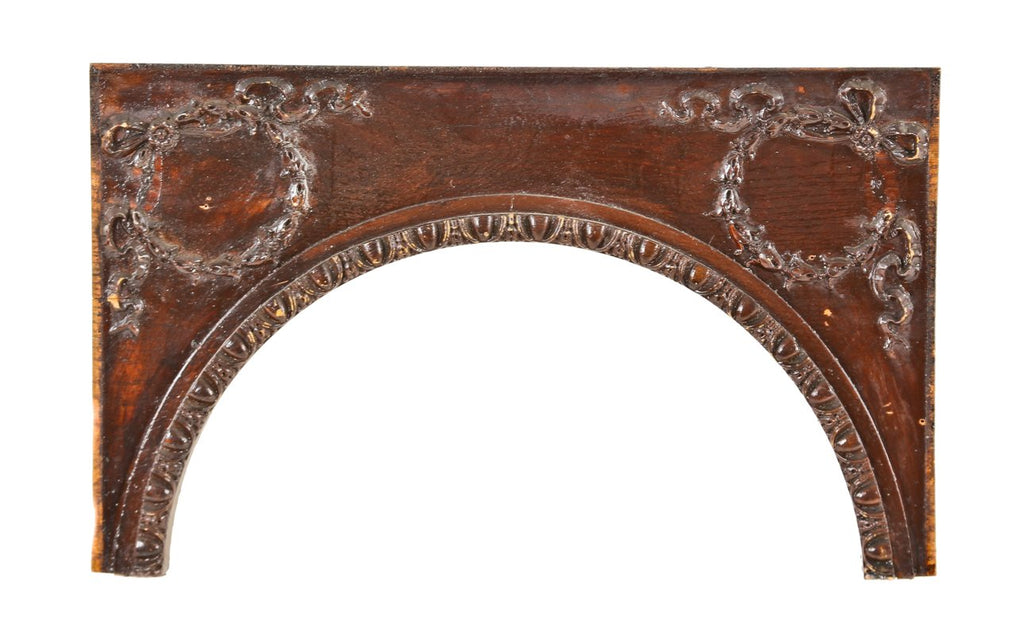 late 1890's original and intact antique american interior residential varnished oak wood double-sided ornamented arched passage header panel with gesso laurel wreaths and ribbons