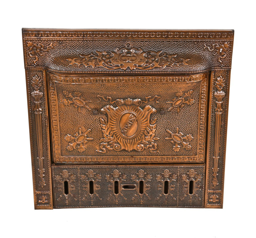 hard to find all original and well-maintained late 19th century copper-plated ornamental steel and cast iron interior residential fireplace gas insert with intact summer cover