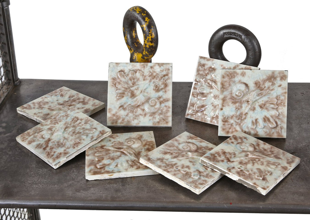 all original late 19th or early 20th century matching lot of antique american victorian era deeply embossed mottled majolica glazed residential fireplace tiles