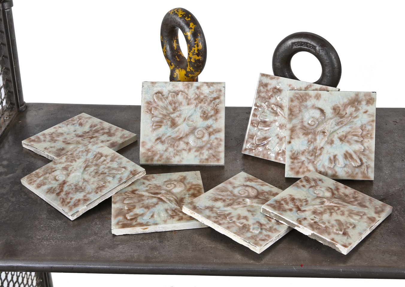 all original late 19th or early 20th century matching lot of antique american victorian era deeply embossed mottled majolica glazed residential fireplace tiles