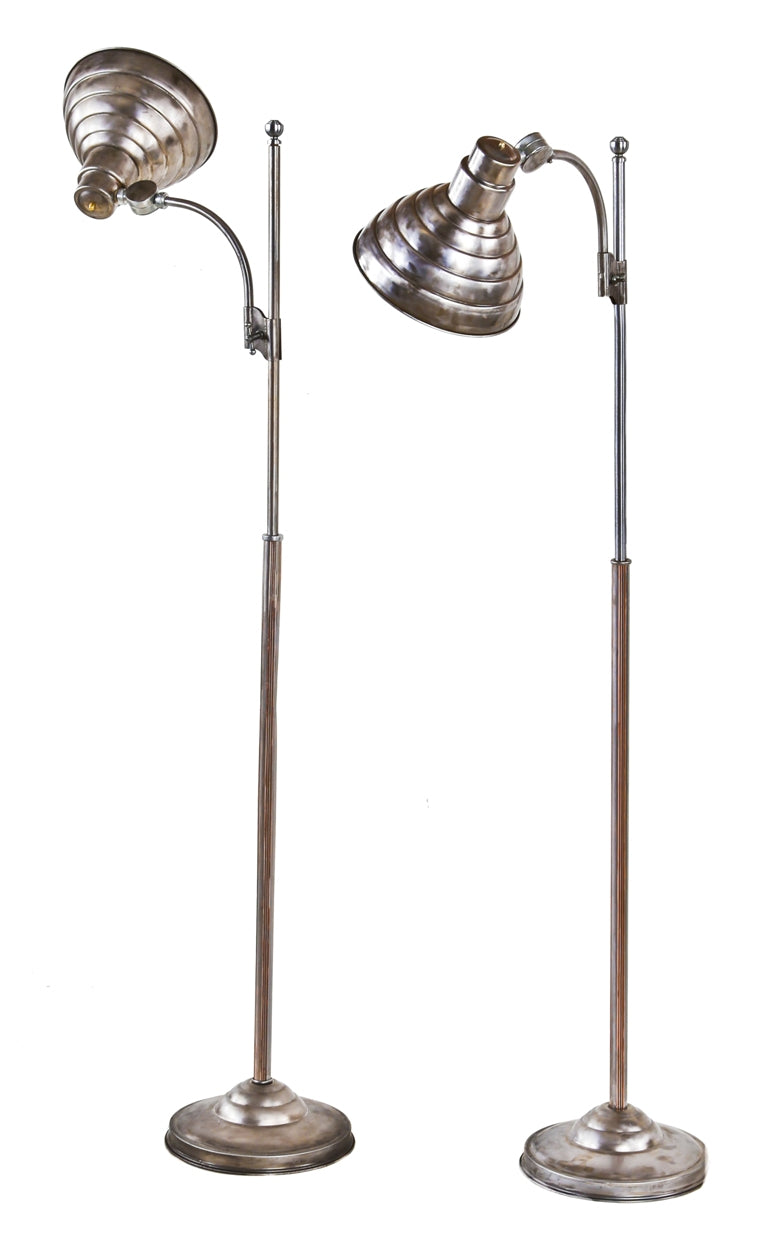 two matching refinished late 1930's american art deco machine age adjustable height weighted base floor lamps with brushed steel stepped shades