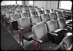 original c. 1920's antique american ornamental red painted cast iron figural theater seat end and armrest salvaged from the gethsemane missionary baptist church
