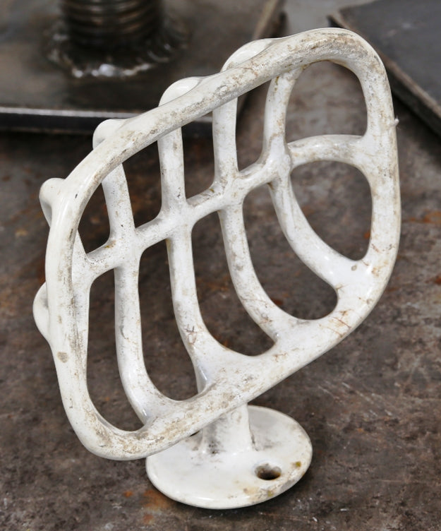 original early 20th century "rib cage" style white porcelain or vitreous enameled wall-mount factory washroom soap dish with circular-shaped backplate