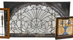impressive early 1880's antique american enormous interior commercial building victorian era arch top leaded glass transom window with abundant leafage and scrollwork