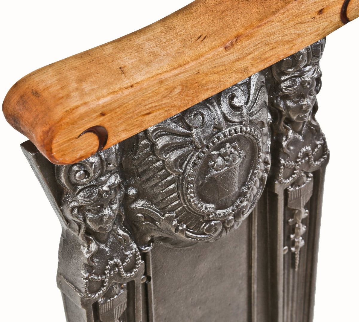 refinished original c. 1920's freestanding heavily ornamented cast iron theater seat end with solid birch wood set rest and opposed female faces with flowing hair