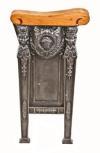 refinished original c. 1920's freestanding heavily ornamented cast iron theater seat end with solid birch wood set rest and opposed female faces with flowing hair