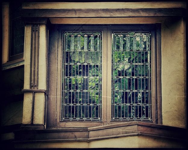 early 20th century historically-important frank lloyd-wright designed oversized william e. fricke house leaded art glass window with custom-built oak wood frame