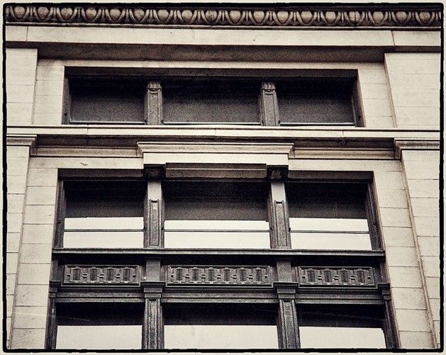 original 1904 oversized neoclassical style exterior northwestern railroad commercial office building ornamental corbel or bracket with original unrestored black paint finish
