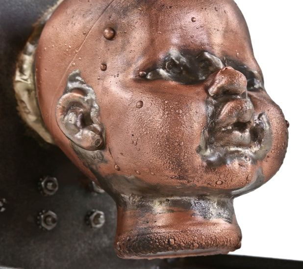 visually distinctive c. 1960's refinished american vintage industrial toy factory copper doll head mold with reconfigured welded joint steel moutning bracket