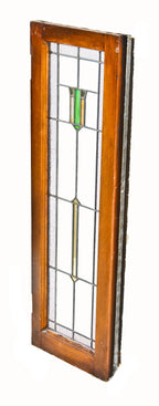 early 20th century chicago bungalow strongly geometric leaded art glass interior residential long and narrow sidelight with a single colorful slag glass shield