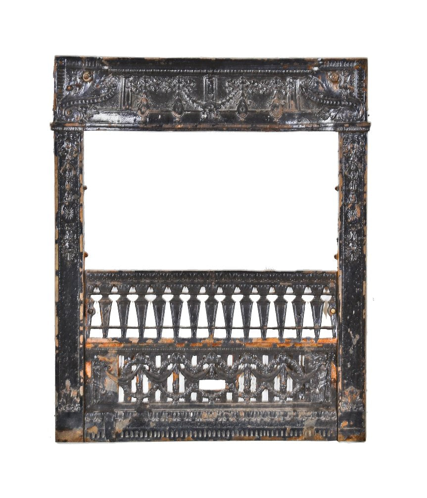 late 19th or early 20th century ornamental cast iron antique american victorian era interior residential fireplace gas insert grille or grate with old black paint finish