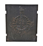late 19th or early 20th century antique american ornamental black enameled cast iron interior residential fireplace fireback with laurel wreath and torche
