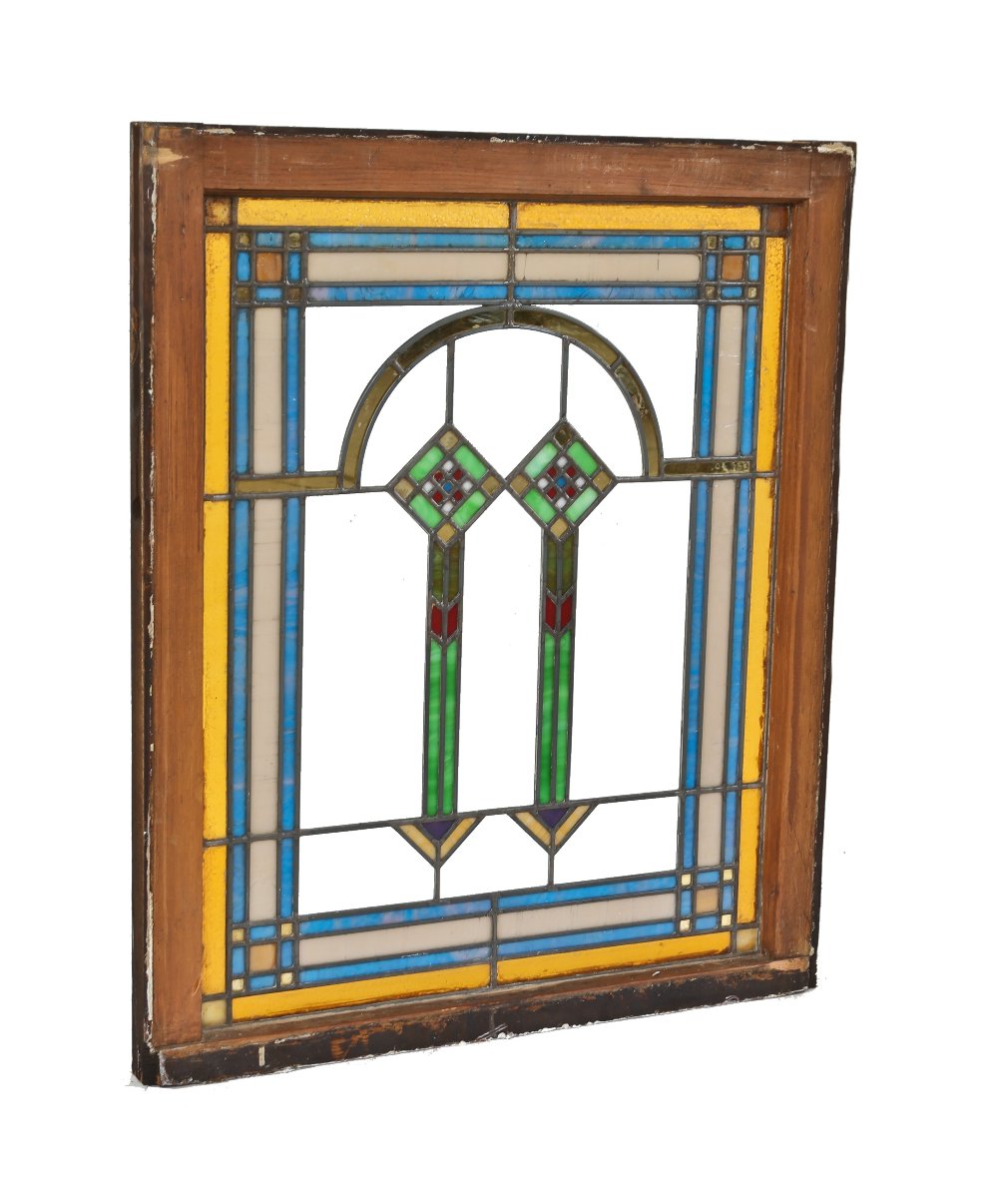 all original and well-maintained early 1920's american antique prairie school style brightly colored art glass window with gold leaf flash glass accent