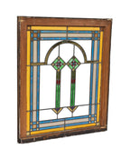 all original and well-maintained early 1920's american antique prairie school style brightly colored art glass window with gold leaf flash glass accent