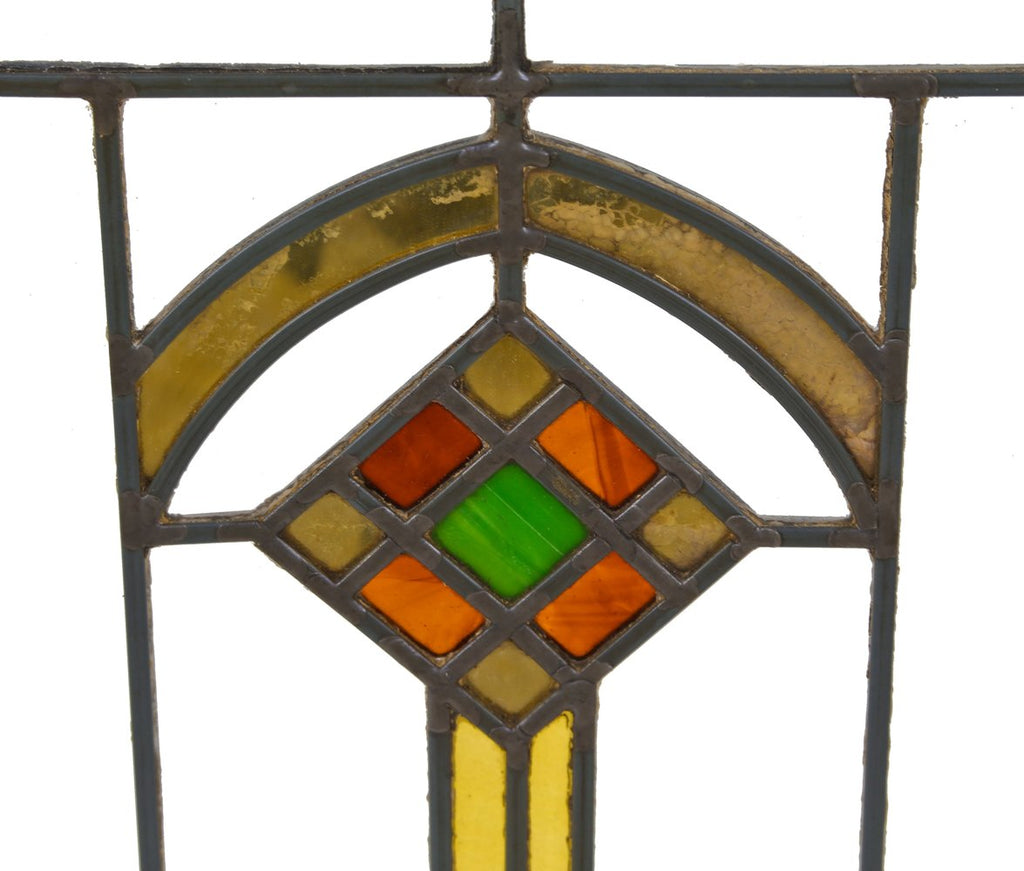 original early 1920's prairie school style interior residential leaded art glass window featuring a centrally located segmented diamond with gold "flash" glass
